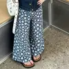 2026 Nuevo Estilo de Verano para Niñas Estilo Coreano Casual Súper Lindo Conjunto de Venta Caliente de Chaleco de Mezclilla y Pantalones Florales para Niños