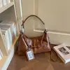 Bolso de Axila para Mujer 2026 Nuevo Otoño Gama Alta Retro Versátil para Viajes Diarios Bolso de Hombro Único Bolso Cruzado de Gran Capacidad