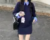 Conjunto de Punto Informal Transfronterizo para Mujer Otoño/Invierno 2026 Nuevo Top con Cuello de Camisa Rayado Patchwork Falda Dos Piezas