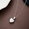 Nuevo traje de colgante de aretes de lazo de acero de titanio transfronterizo estilo callejero europeo y estadounidense de acero inoxidable que no se desvanece joyería para hombres y mujeres