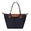 Bolso versátil de moda transfronterizo para mujer, nuevo bolso tote ligero de tela de nailon de alta gama, bolso de hombro y bandolera moderno para el día a día