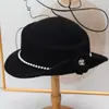 Nuevo sombrero pequeño estilo Hepburn, sombrero retro y elegante estilo francés para otoño/invierno, un sombrero que hace que la cara se vea más pequeña, sombrero de pescador tejido para mujer
