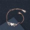 Venta caliente transfronteriza versión coreana de pulsera familiar creativa corazón de melocotón tres hermanas pulsera de acero de titanio diseño de nicho Joker al por mayor