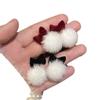 Pendientes de peluche con lazo de terciopelo rojo para mujer, pendientes de bola de pelo con atmósfera de Año Nuevo, pendientes de otoño e invierno de alta calidad que combinan con todo.
