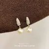 Sistema de color Maillard retro nicho minimalista de alta gama aretes de mariposa para otoño e invierno versátiles simples para el día a día