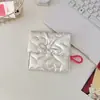 Bolsa de Maquiagem Ins Estilo Coreano Acolchoada em Formato de Coração, Bolsa Clutch Fofa Prateada, Porta-Moedas e Fones de Ouvido, Bolsa Sanitária Portátil