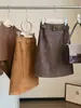 Saia Midi de Pelúcia Camurça Estilo Coreano Retrô Feminina Design de Outono Senso de Temperamento Cintura Alta Emagrecedora Versátil Fenda Justa ao Corpo Saia Reta
