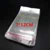 7*12 cada uno 200 bolsas pequeñas de plástico al por mayor bolsa pequeña para joyería auto-sellante bolsa de embalaje opp autoadhesiva