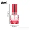 Botella de spray de perfume de vidrio de color hexagonal con rodillo de diamante en stock al por mayor, botella decantadora de perfume de alta estética