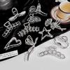Europa e Estados Unidos simples metal geométrico rede vermelho temperamento frio estrelas grampo de cabelo personalidade amor volta cabeça agarrar clipe atacado
