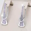 Venda Quente Europeia e Americana Rodada Irregular Diamante Branco Super Brilhante Salto Alto Design Argola de Orelha Personalidade de Alto Padrão Brilho Leve Brincos