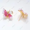 Anillo de Perla, Aretes, Colgante Juego de Tres Piezas con Diseño de Cristal de Goteo de Aceite de Mariposa Vacía, Lujo Ligero DIY de Gama Alta
