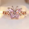 Anel de borboleta com diamante roxo transfronteiriço, design personalizado moderno e requintado, joia da moda popular, acessório de mão feminino
