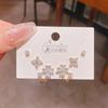 Verano nuevo chapado en oro real exquisitos tres pares de aretes pequeños de alto sentido pequeños frescos dulces aretes de temperamento combinables