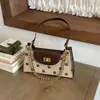 Bolsa feminina de camurça 2026 novo outono vintage Maillard bolinhas bolsa de ombro axila bolsa transversal para o dia a dia