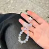 Llavero Colgante de Sirena con Lazo de Perlas Nuevo y Moderno Accesorio Pequeño para Funda de Teléfono Regalo para Niñas