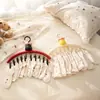 Colgador de ropa multi-clip con forma de flor negra para uso doméstico, adecuado para calcetines y ropa interior, herramienta multifuncional pequeña de almacenamiento de ropa