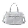 2026 Nuevo Bolso Casual Pequeño Cruzado de Nailon para Viajes Diarios Bolso de Hombro Ligero Resistente al Agua Bolsa Cuadrada Pequeña