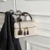 Shuai Mijia 2026 Nueva Moda Bolso de Mano Pequeño Cuadrado para Mujer Estilo Coreano Simple Bolso de Hombro Texturizado de Moda Bolso Cruzado