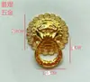 Manija de cabeza de león antigua característica grifo de aleación caja de vino manija pequeña puerta de casa grande tira de puerta dorada estuche de cuero Té