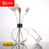 Botella de Aromaterapia Plana Redonda de Lujo Ligero Transfronteriza Botella de Vidrio 50ml/100ml/150ml Material Blanco Cristalino Transparente Sin Llama Grabado Fragancia
