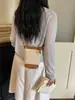 Bolsas de mujer transfronterizas 2026 nueva moda nicho coreana retro bolsa para teléfono móvil bolsa cruzada patchwork de lona bolsa tipo cubo