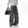 Pantalones de cuadros a bloques de color estilo retro casual 2026 de pierna ancha para hombres y mujeres, nuevos pantalones casuales versátiles de otoño e invierno de corte holgado estilo coreano de largo completo