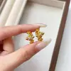 Pendientes Retro de Flor de Iris Cruzada Micro-pavimentados de Trabajo Pesado para Mujer, Joyería para Orejas de Diseño Exquisito Simple Punk Hip-hop de Nicho Personalizado