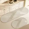 Estilo Ruili alfombrilla de suelo de barro de diatomeas ovalada para cocina alfombrilla larga absorbente de aceite para el hogar fácil de manejar absorbente de agua secado rápido antideslizante