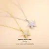 Nuevo Conjunto de Estrellas de Mar Versátil y de Moda Estilo Coreano Collar y Pendientes Mori Dulce Femenino Diseño Simple de Nicho Sensación de Alta Gama
