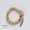 Pequeño oso de leche quema de carbón pulsera de Bodhi Wenwan anillo para correr pulsera enrollable suave femenina Bodhi envejecido pulsera de Doraemon al por mayor
