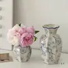 Nuevo Estilo Chino Medieval Azul y Blanco Porcelana Retro Jarrón Cerámica Arreglo Floral Sala de Estar Decoración Adornos Arreglo Floral Arreglo Floral