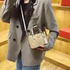 Bolso de mujer nuevo de alta gama estilo francés 2026, bolso de mano estampado, bolso versátil de hombro y cruzado, bolso de moda para mujer
