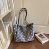 Bolso de mano único y elegante de lunares para mujer, nuevo bolso de hombro casual de moda 2026, bolso de gran capacidad para el trabajo