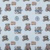 Fabricantes de Keqiao nuevo jacquard de cachemira oso de dibujos animados textiles para el hogar bolsos tela para ropa de otoño e invierno tela de jacquard de cachemira