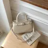 Bolsa Transversal de Ombro Único Color Block Versátil Retrô para o Dia a Dia Grande Capacidade Pequena Quadrada Nicho Simples Moda Bolsa de Mão Kelly