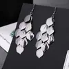 ¡Guau!Moda Transfronteriza Europea y Americana, Varios Pendientes Largos Metálicos de Borla Exagerada de Estilo Moderno con Elementos Elegantes