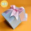 En stock embalaje de regalo caja de regalo lazo regalo tapa superior e inferior banda caja de cartón caja vacía personalizado al por mayor