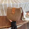 Bolso Cubo Tejido Hueco 2026 Nuevo Estilo Primavera Estilo Perezoso Gran Capacidad Bolso de Hombro de Alto Valor Bolso de Vacaciones en la Playa