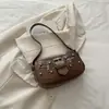 Bolsa de Braço Feminina Estilo Francês 2026 Verão Nova Moda Retrô Versátil Temperamento Bolsa Meia-Lua Casual Simples Bolsa de Ombro