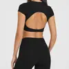 Top de yoga transfronterizo hueco de manga larga para mujer, con sujetador incorporado, elegante diseño en la espalda, camiseta de fitness, ajustado, de secado rápido y manga corta para deportes