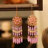 Pendientes Bohemios de Colores de Longitud Media de Yunnan Pendientes Multicapa Suministro Transfronterizo Venta al por Mayor Pendientes de Dopamina