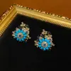 Bronze Ocidental Banhado 18 Ouro Retrô Antigo com Pedra Azul e Design de Strass Azul Tinta Branca