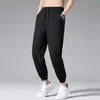 Pantalones casuales de seda helada para hombre de verano, delgados, transpirables, de secado rápido, corte holgado, con caída, estilo jogger, pantalones deportivos de secado rápido