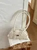 Bolso de mano de alta gama, versátil para mujer, nueva moda 2026, bolso de hombro exquisito, estilo coreano, bolso tipo bowling de nicho