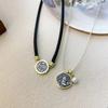 Collar de cuerda de cuero con circonita y moneda antigua de dos colores para mujer, nuevo collar de estilo retro con temperamento personalizado, diseño avanzado de nicho