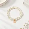 Nuevo Estilo Cadena de Perlas Luna Blanca Goma para el Cabello para Mujeres, Diadema de Gama Alta, Cuerda para el Cabello Elegante y con Estilo