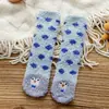 Calcetines de dormir de garra de gato de invierno Calcetines de terciopelo de coral Calcetines de piso para niños Calcetines de tubo medio gruesos y cálidos Calcetines dispensadores para bebé Venta al por mayor