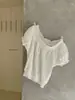 Wgwe9679 Ropa de Mujer Shisanxing Guangzhou 2026 Verano Nuevo Estilo Talla Pequeña Camisa de Hombros Descubiertos de Manga Corta Top Delgado