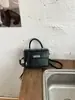 Bolso Transfronterizo Textura Retro Bolso Tote Pequeño para Mujer 2026 Nuevo Bolso Cuadrado Pequeño Simple Bolso Versátil de Hombro Cruzado Moderno